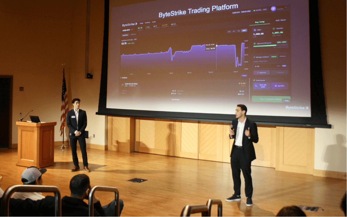A Georgetown Ventures team presenting product and market slides at Demo Day